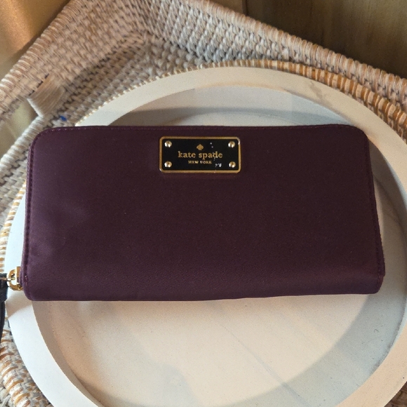 kate spade Handbags - Kate Spade Plum Wallet